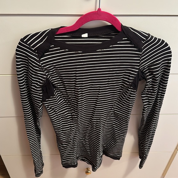 Lululemon on long sleeve exercise top. Breathable material in armpits into back. - Picture 2 of 4